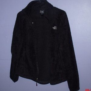 black fuzzy north face jacket